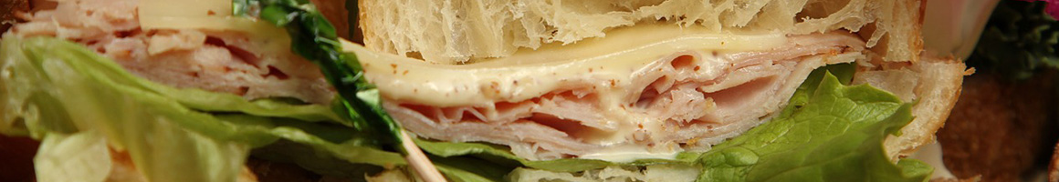 Eating Sandwich at Classic Sub Shop restaurant in Hamilton Square, NJ.